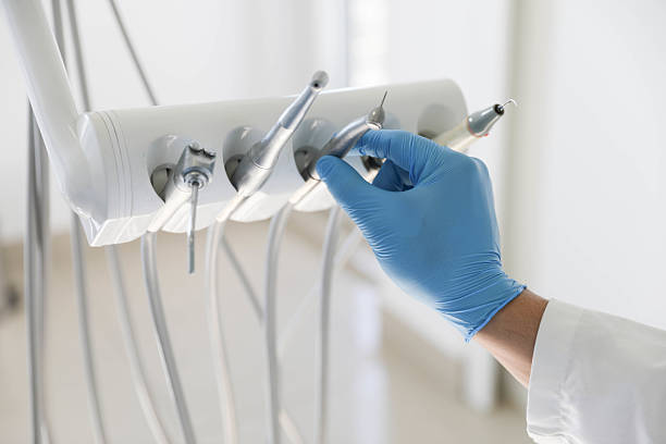 Professional Tooth Extraction technician working in Arlington Heights, IL